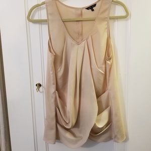 Cream sleeveless blouse